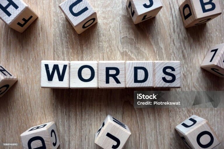 Words text from wooden blocks on desk